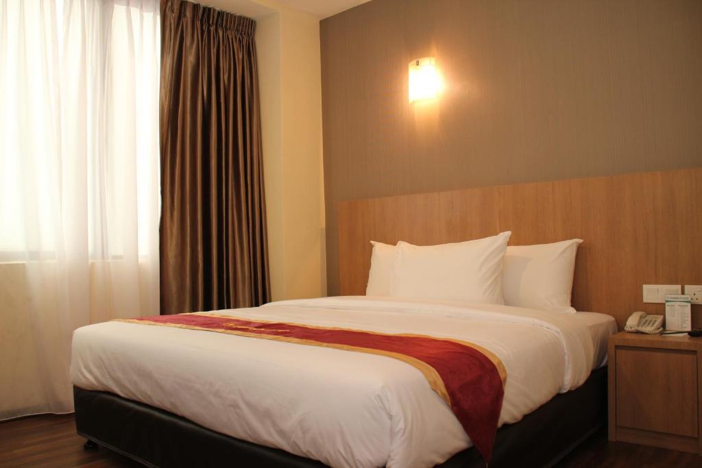 Baguss City Hotel Τζόχορ Μπάχρου Δωμάτιο φωτογραφία