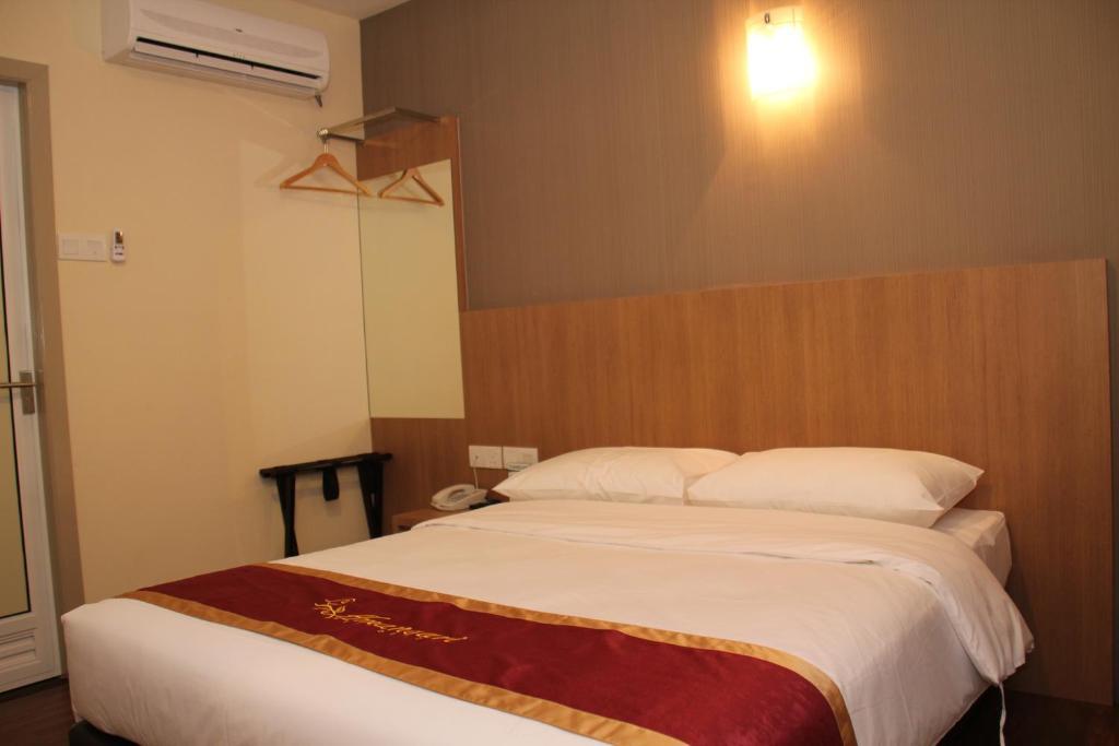 Baguss City Hotel Τζόχορ Μπάχρου Δωμάτιο φωτογραφία